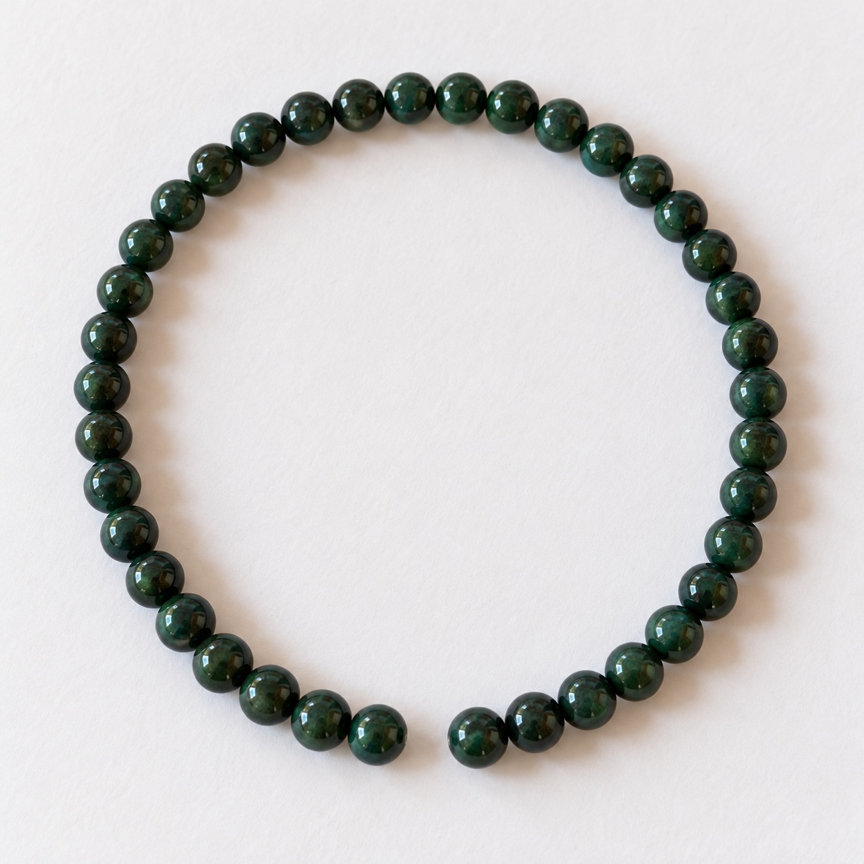 Dark green bead strand · 4 mm, 45 beads per strand
