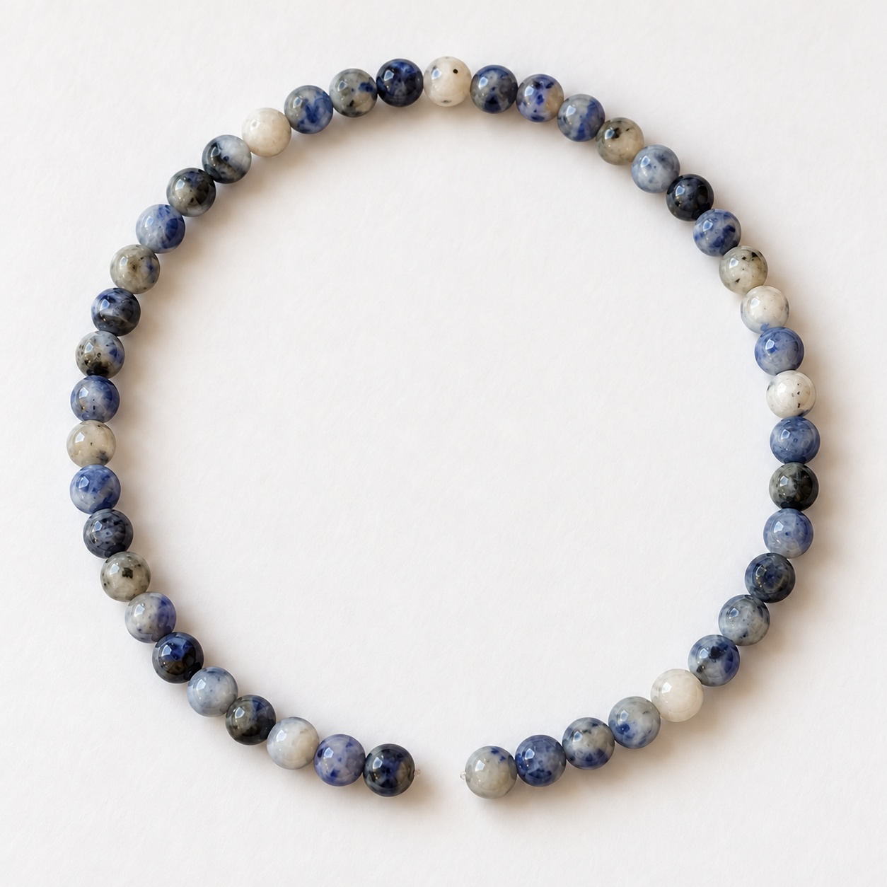 Blue & white bead strand · 4 mm, 45 beads per strand